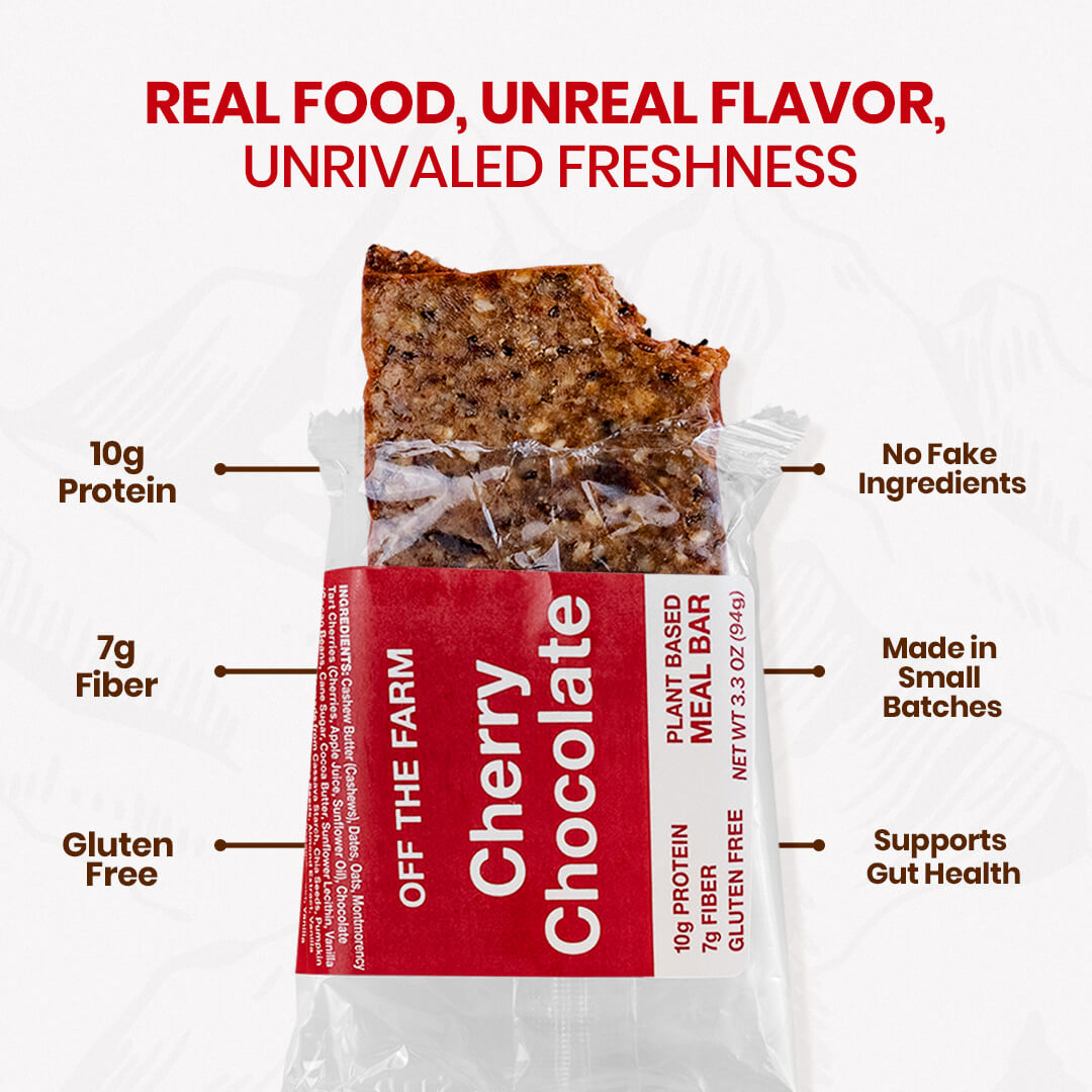 Plant-based meal bar packaging with cherry chocolate flavor, showing nutritional information and product details.