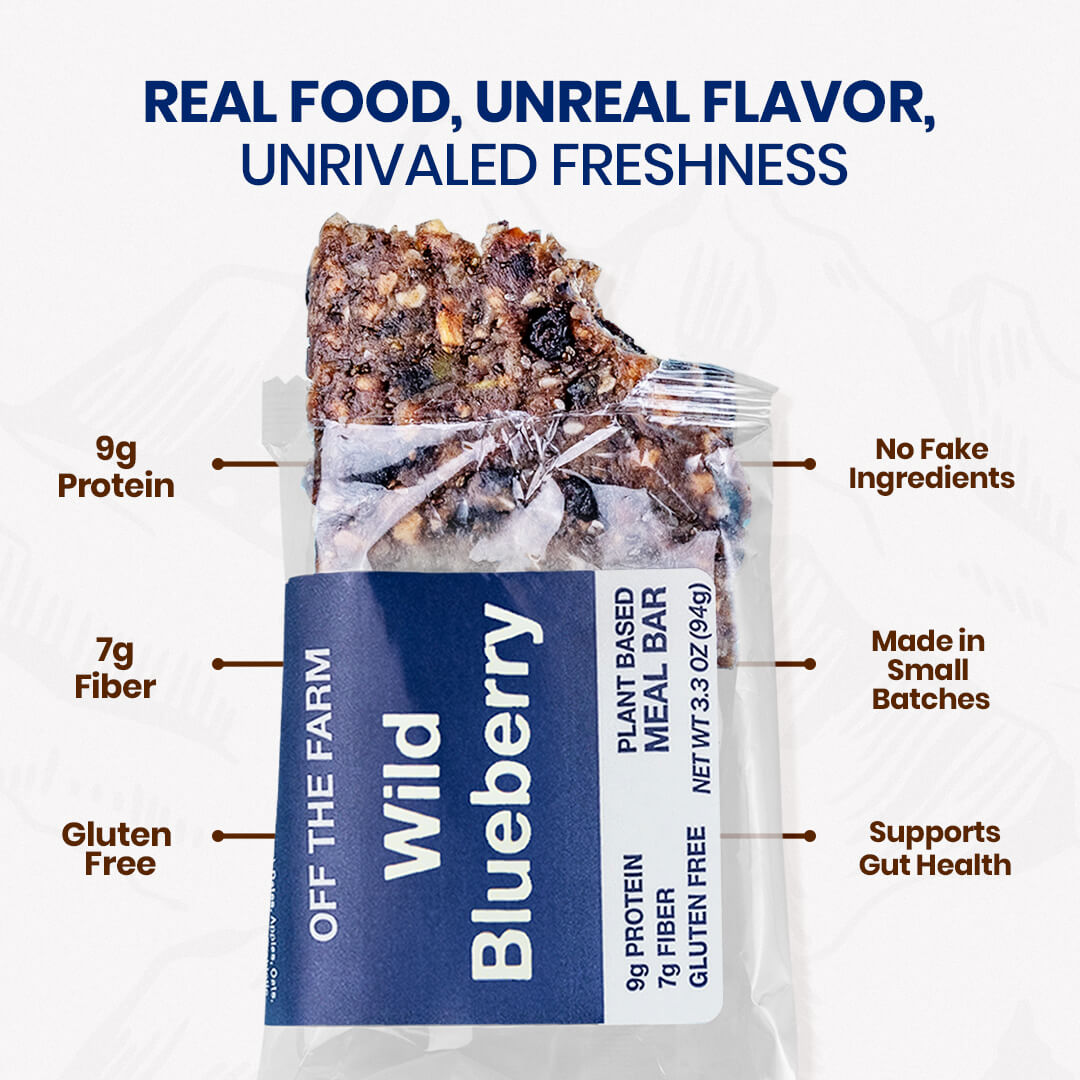 Wild Blueberry meal bar packaging with nutritional information and product features on a white background