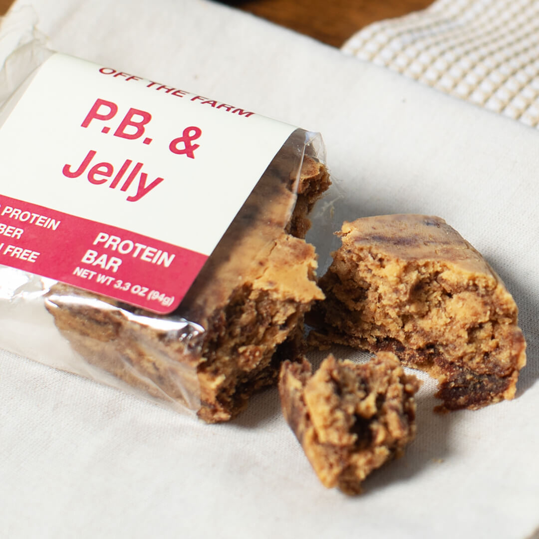 Protein bar with 'P.B. & Jelly' packaging on a white surface
