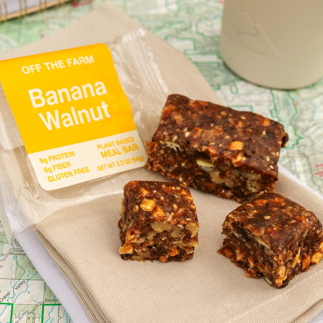 Banana Walnut meal bar with packaging on a map background