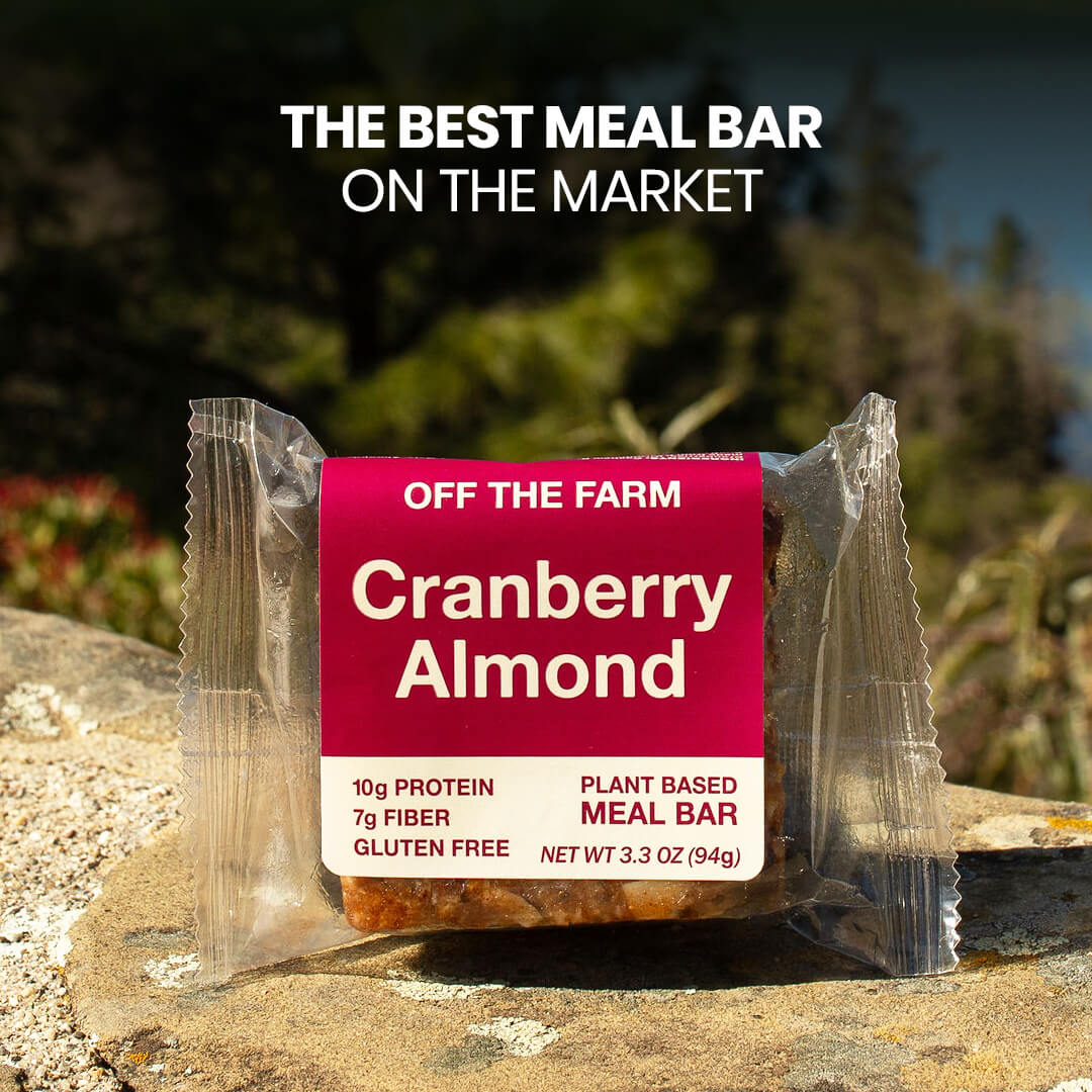 Cranberry Almond meal bar packaging with scenic background