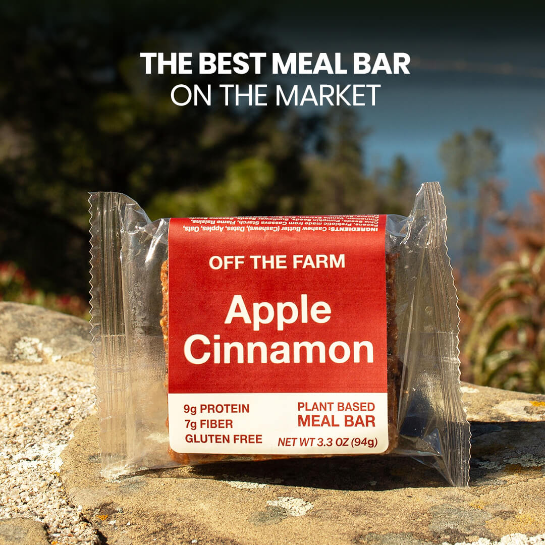 Apple Cinnamon meal bar packaging with scenic background