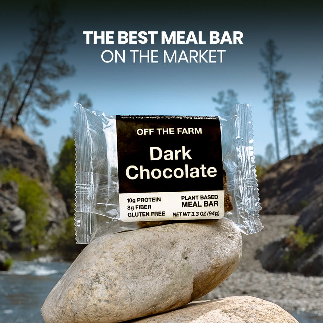 OFF THE FARM Dark chocolate meal bar packaging on a rock with a natural background